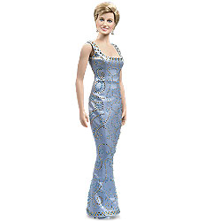 Princess Diana Vinyl Portrait Doll The Franklin Mint's Princess Diana Vinyl Portrait Doll with blue beaded silk gown. $245 USD.