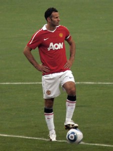 450px-Ryan_Giggs_vs_MLS_All_Stars_2010 Ryan Griggs, soccer player, standing on field