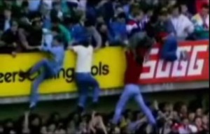 Hillsborough_tragedy Persons scramble away from the human crush in the stadium